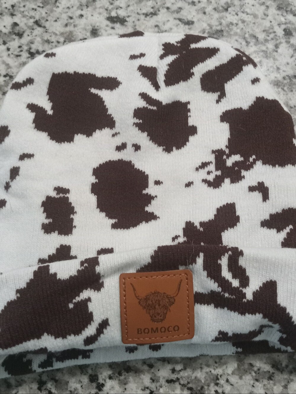 Cow-Print Beanie Hat in White and Brown